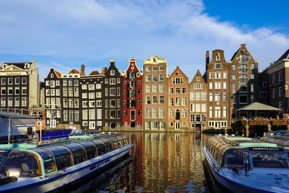 Canal houses and boats along an Amsterdam canal
